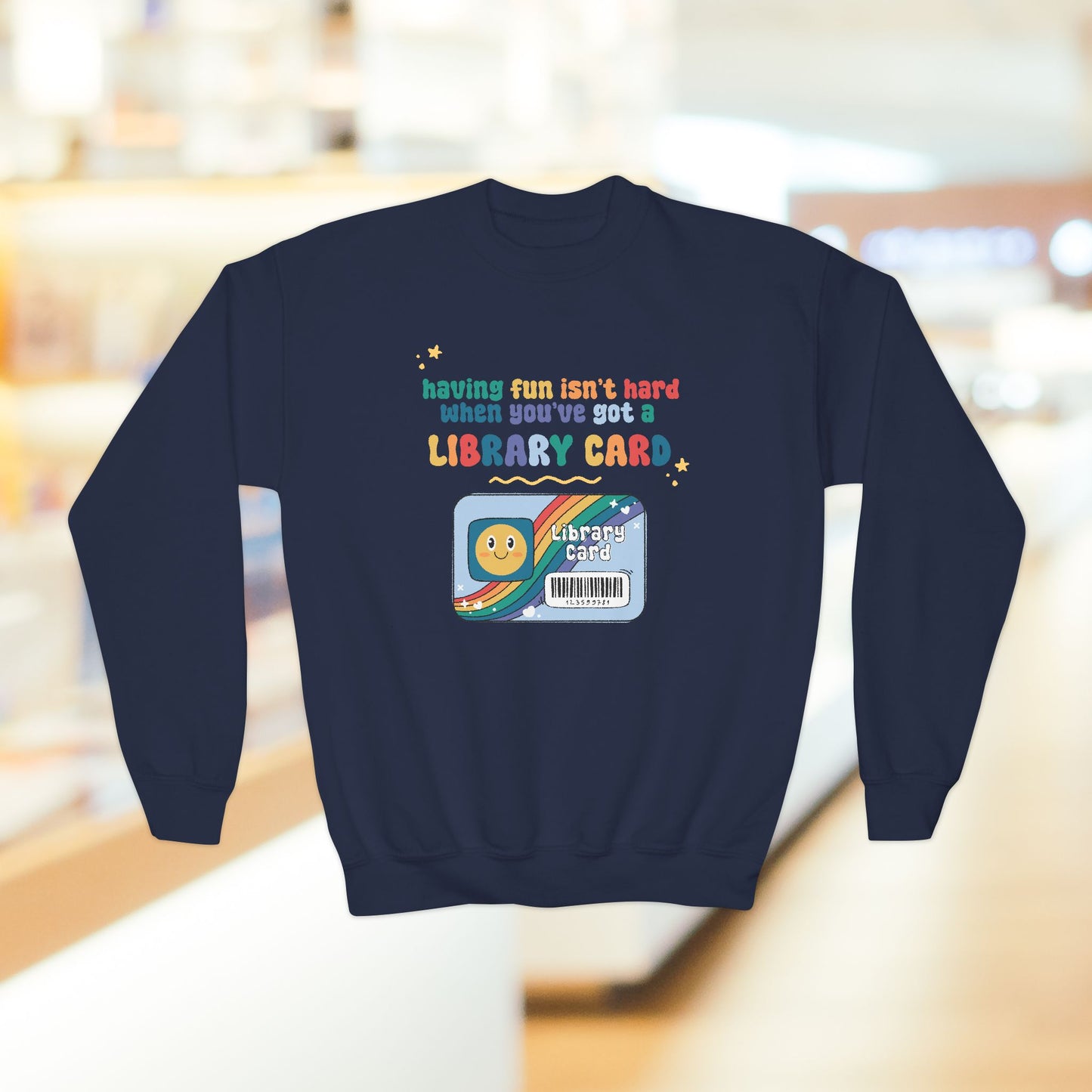 Youth Crewneck Sweatshirt — "Having Fun Isn’t Hard When You’ve Got a Library Card" Retro Library Card Design